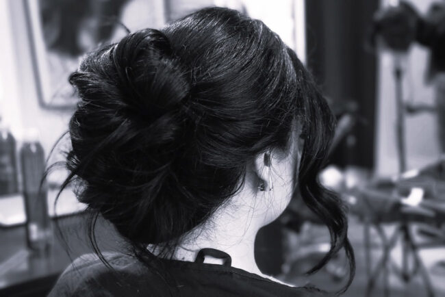 stylist consulting with client at hair salon in Ridgefield CT